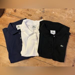 3 pack of lacoste 5 button polo shirts! black blue and white!